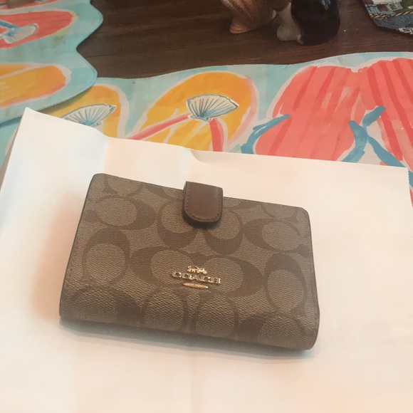 coach small wallet price